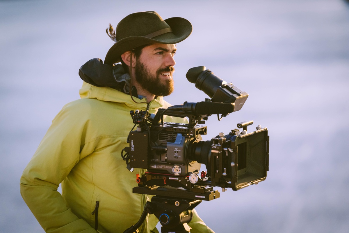 Ethan Parrish operating a cinema camera on location